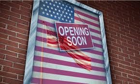 Opening Soon Sign Over Door with American Flag